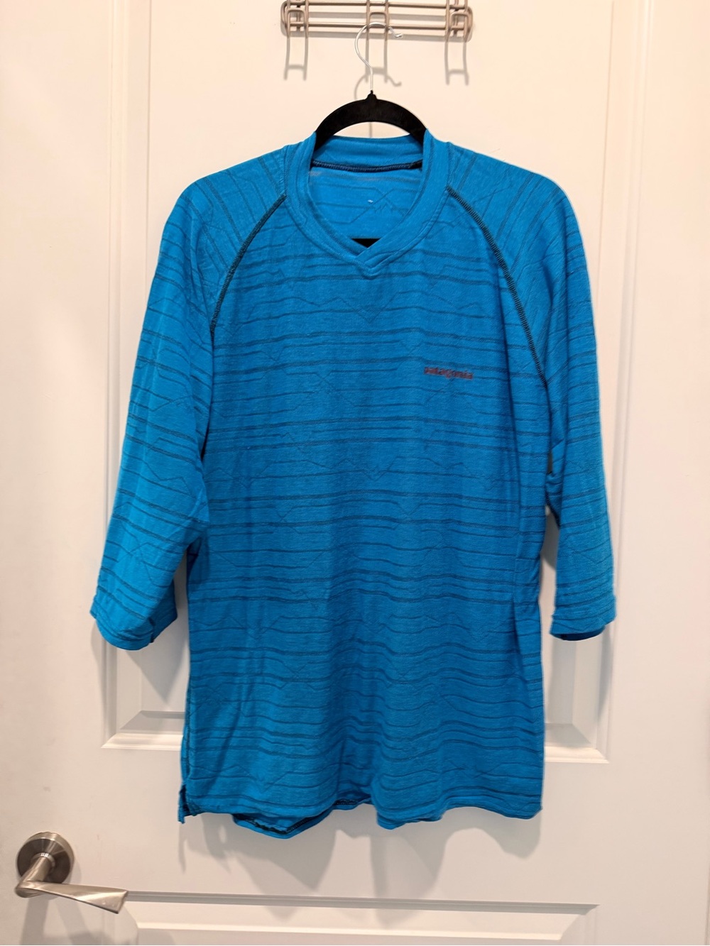 Patagonia 3/4 Sleeve Tee
Blue Striped V-Neck Sample
Shirt Size L